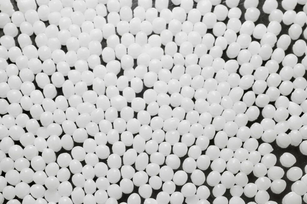Close up picture of polyamide granules, selective focus.